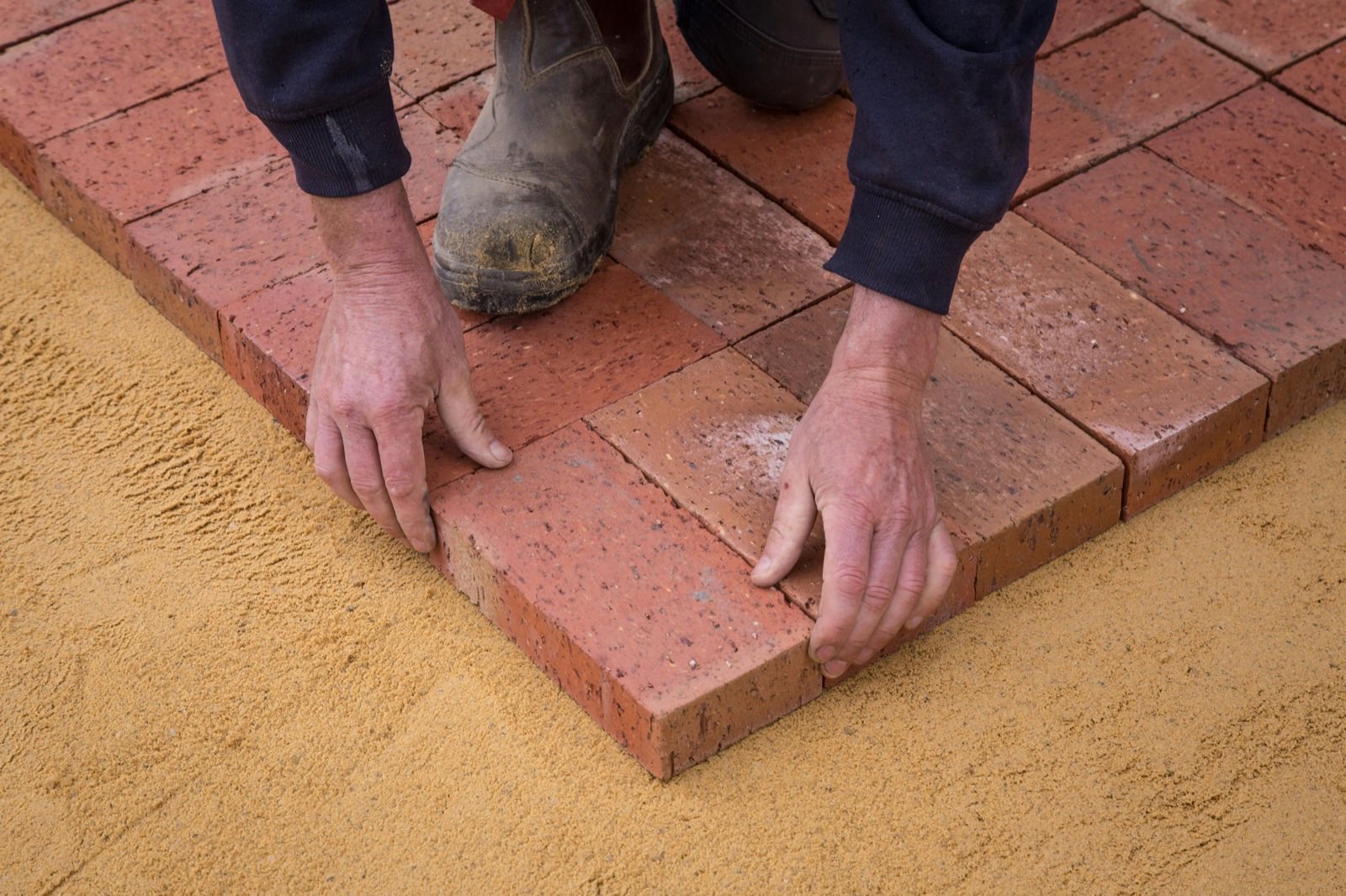 Paver border and edging detail next to concrete